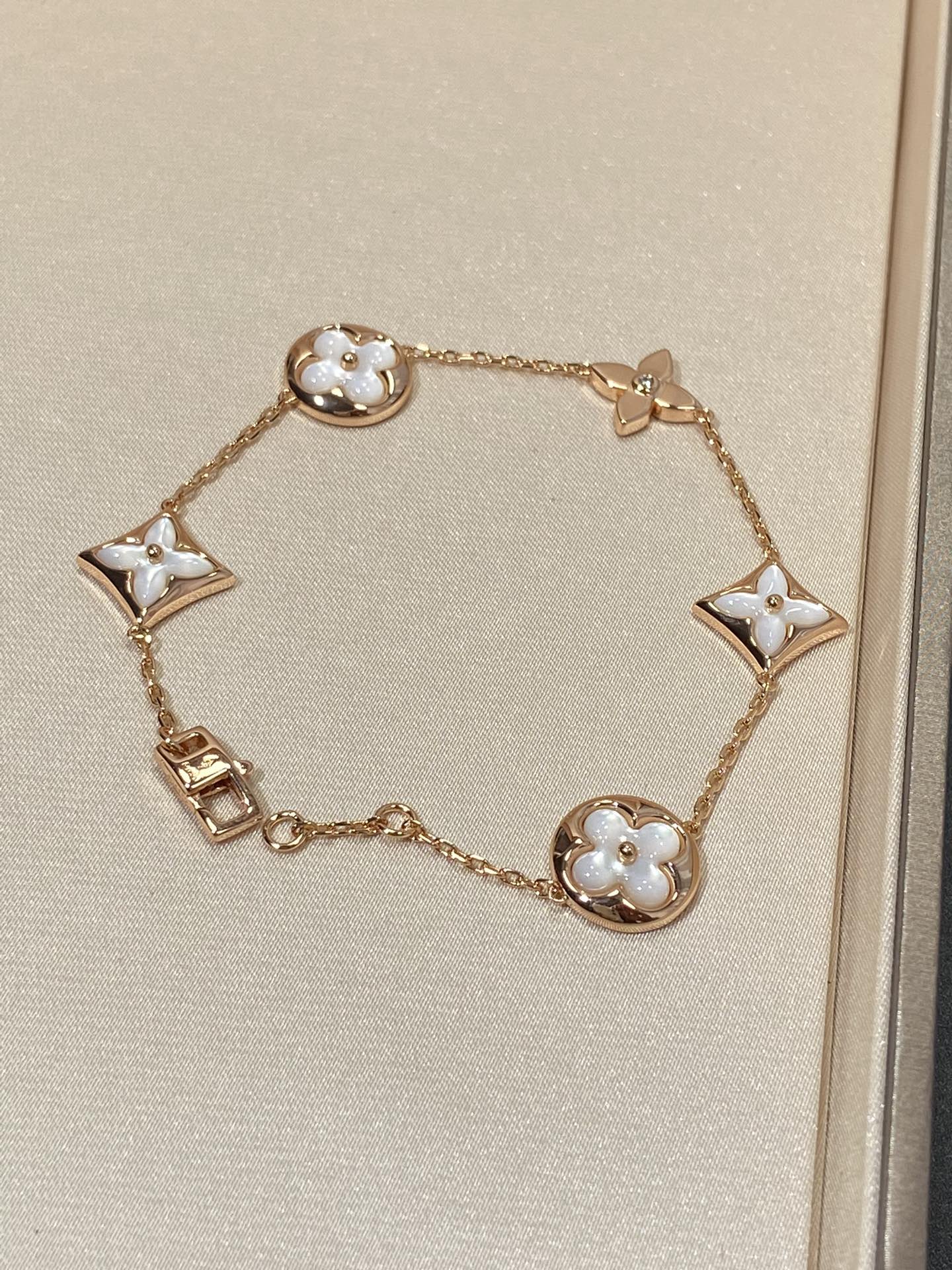 [Kincade Jewelrys]STAR AND SUN 5 MOTIF MOP PINK GOLD BRACELET